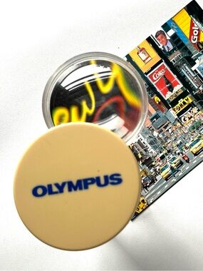 Vintage Magnifying Glass Folding Olympus Corporation Promotional Advertisement